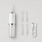 What is included: flosser, 4 jet tips and USB cable